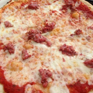 Sausage pizza from a Pizza Trattoria in Lucca